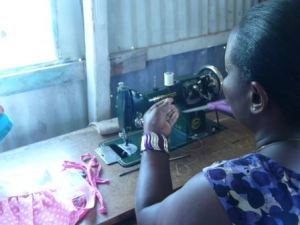 Dadithe getting sewing machine ready